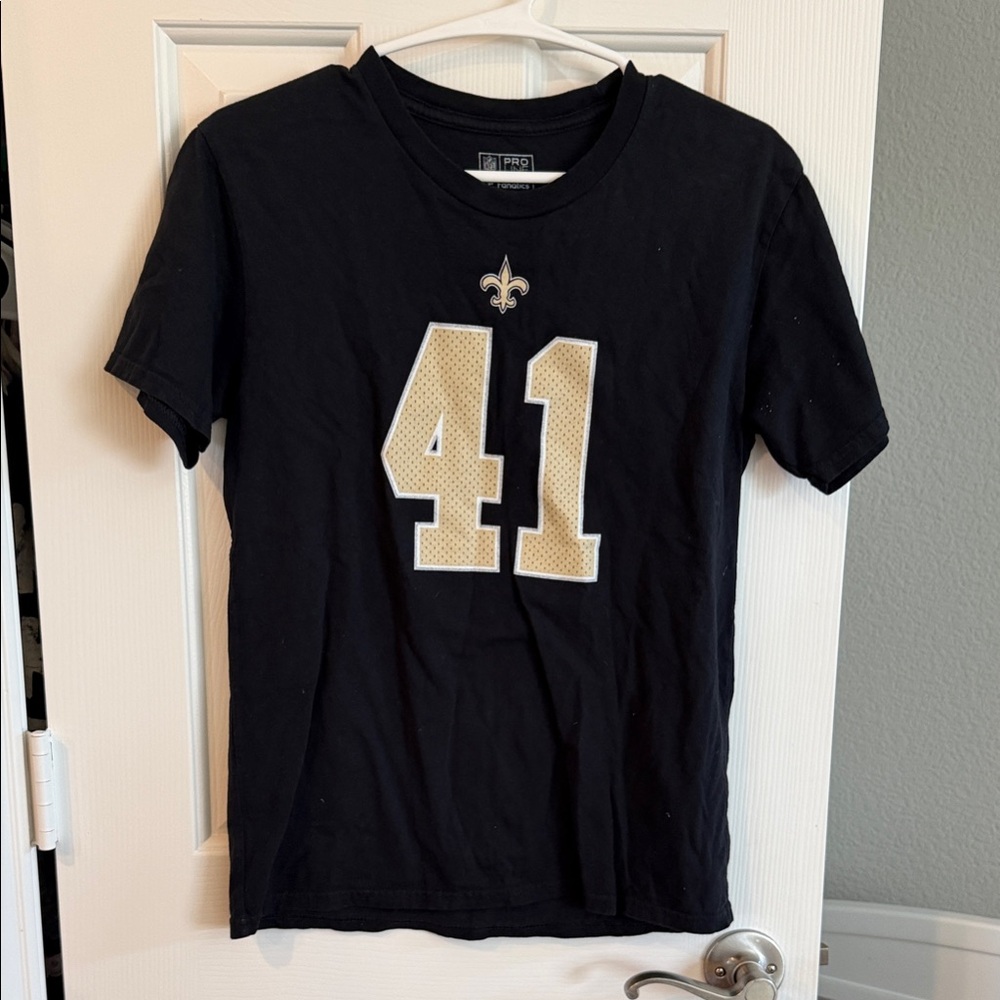 New Orleans Saints and Gold and Black Graphic T-Shirt KAMARA Youth Large